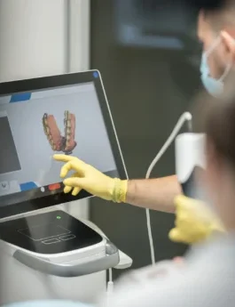 Dentist using technology equipment